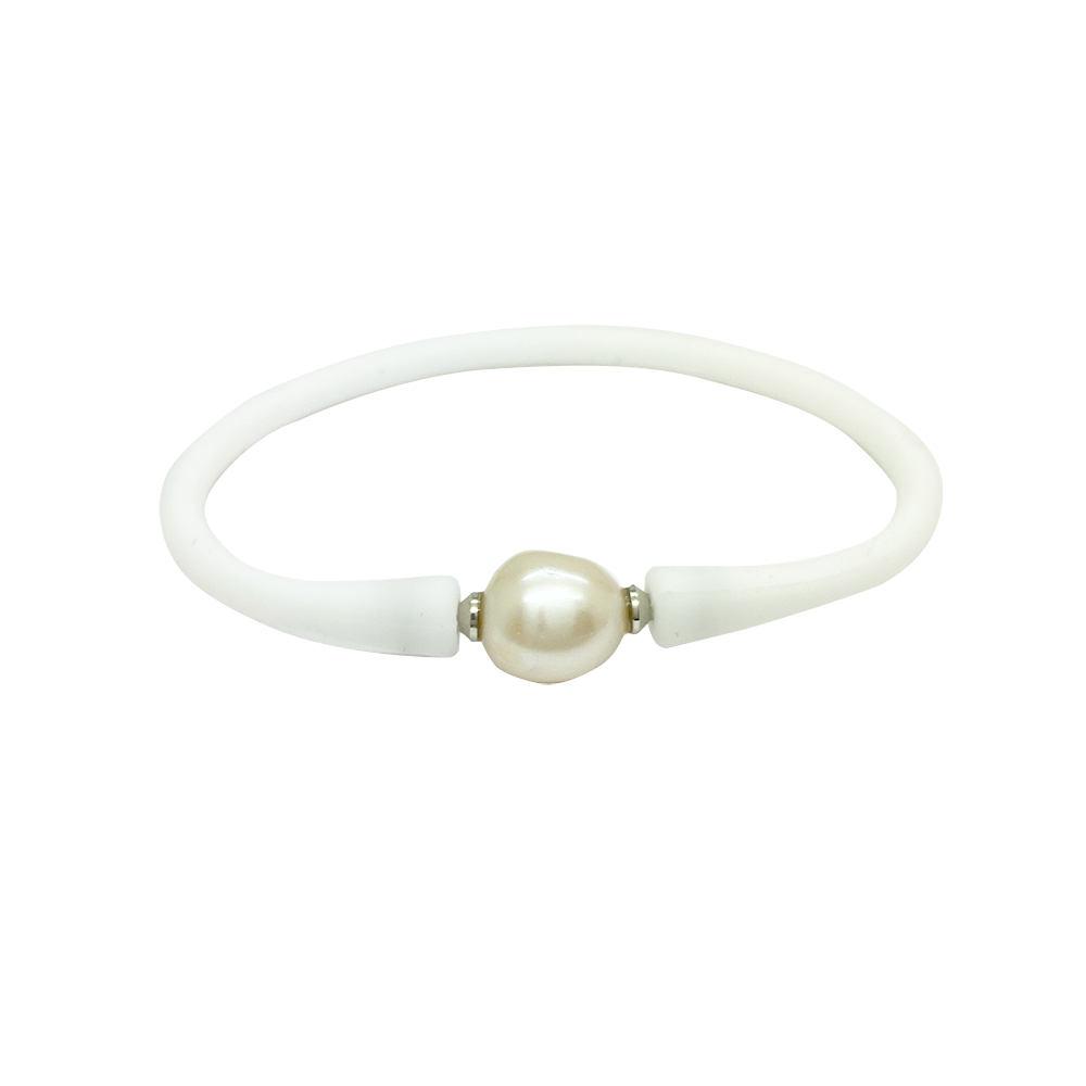 Bracelet with a single white pearl in the center. The bracelet is made of a rubber-like material .
