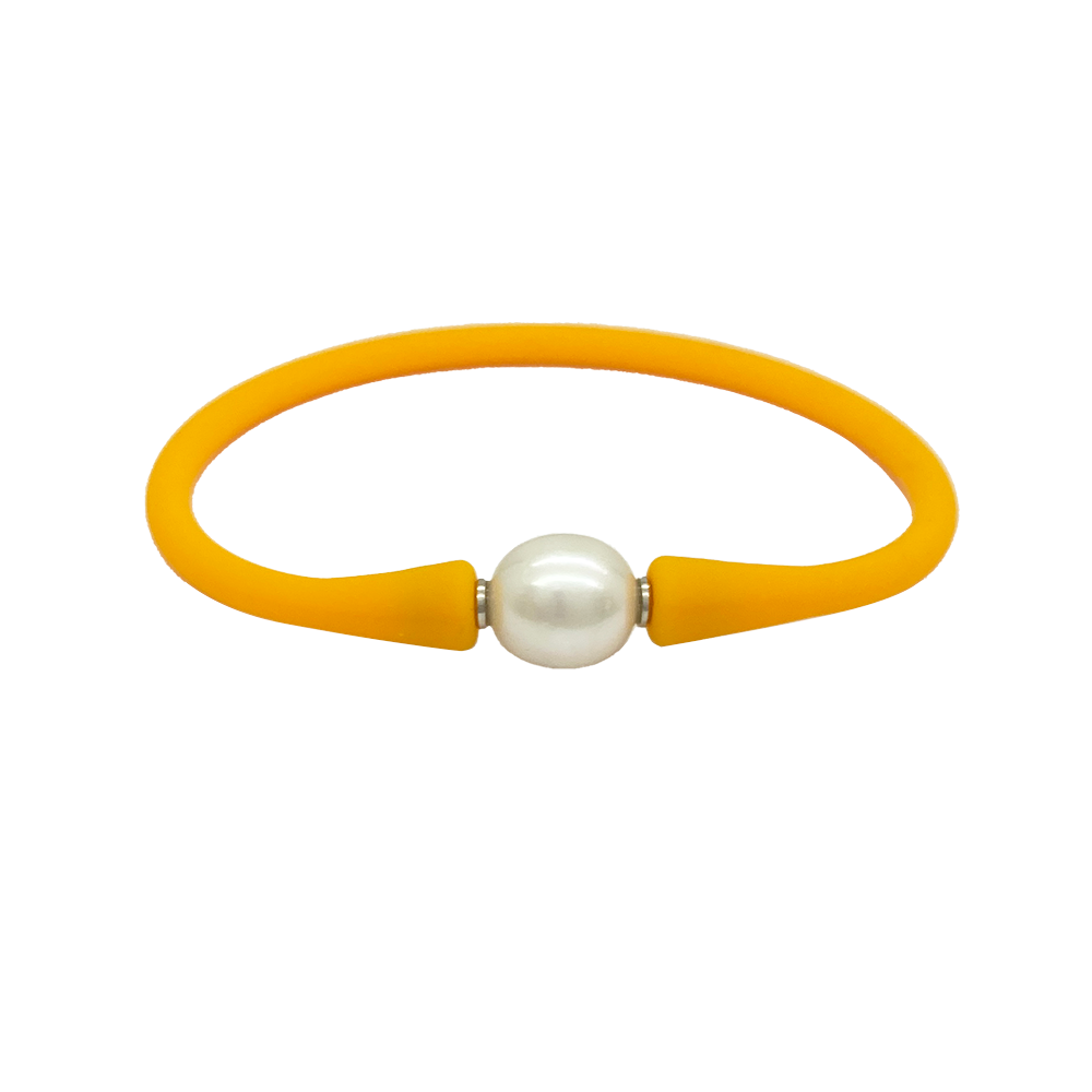 Bracelet with a single white pearl in the center. The bracelet is made of a rubber-like material .