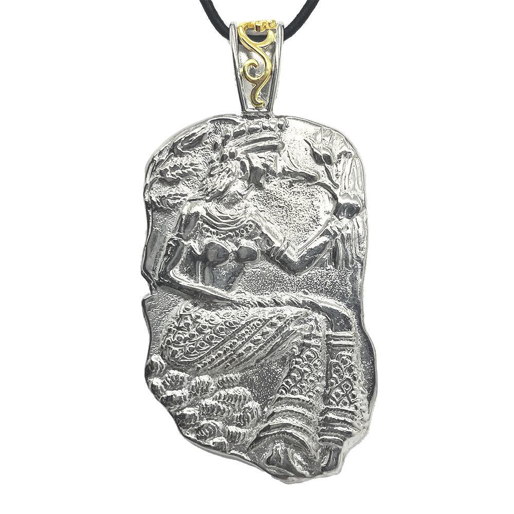 Silver pendant depicting a female figure, possibly a goddess, holding a jar or pitcher.