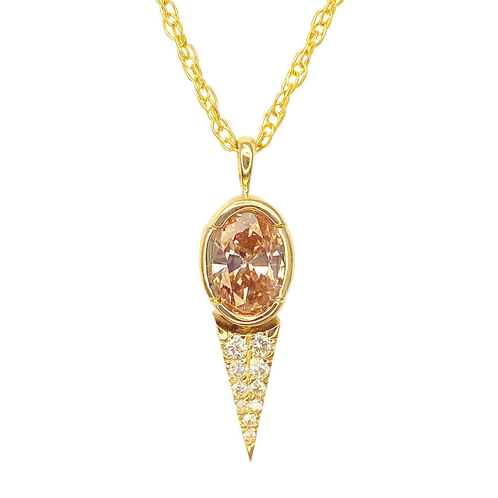 Gold pendant necklace with a large oval champagne diamond set in a bezel