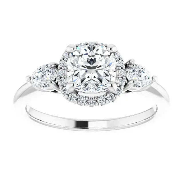 Silver ring with a large central diamond and smaller diamonds on the sides against a white background