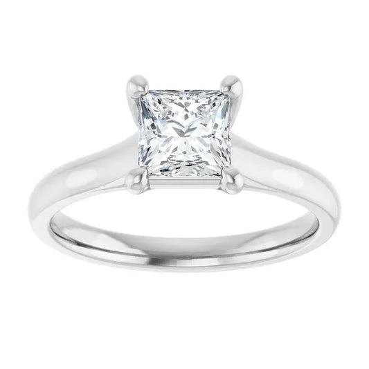 Silver ring with a square-cut diamond on a white background