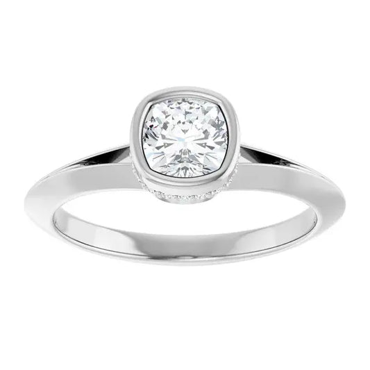 Silver ring with a diamond on a white background