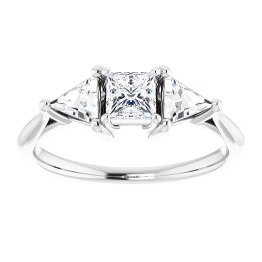 Diamond ring with a three-stone design on a white background