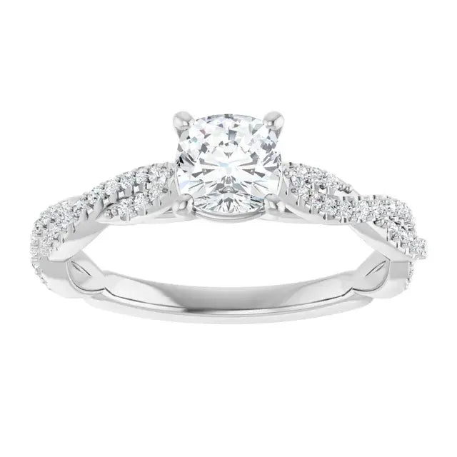 Diamond ring with a white gold band on a white background