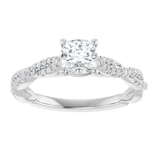 Diamond ring with a white gold band on a white background
