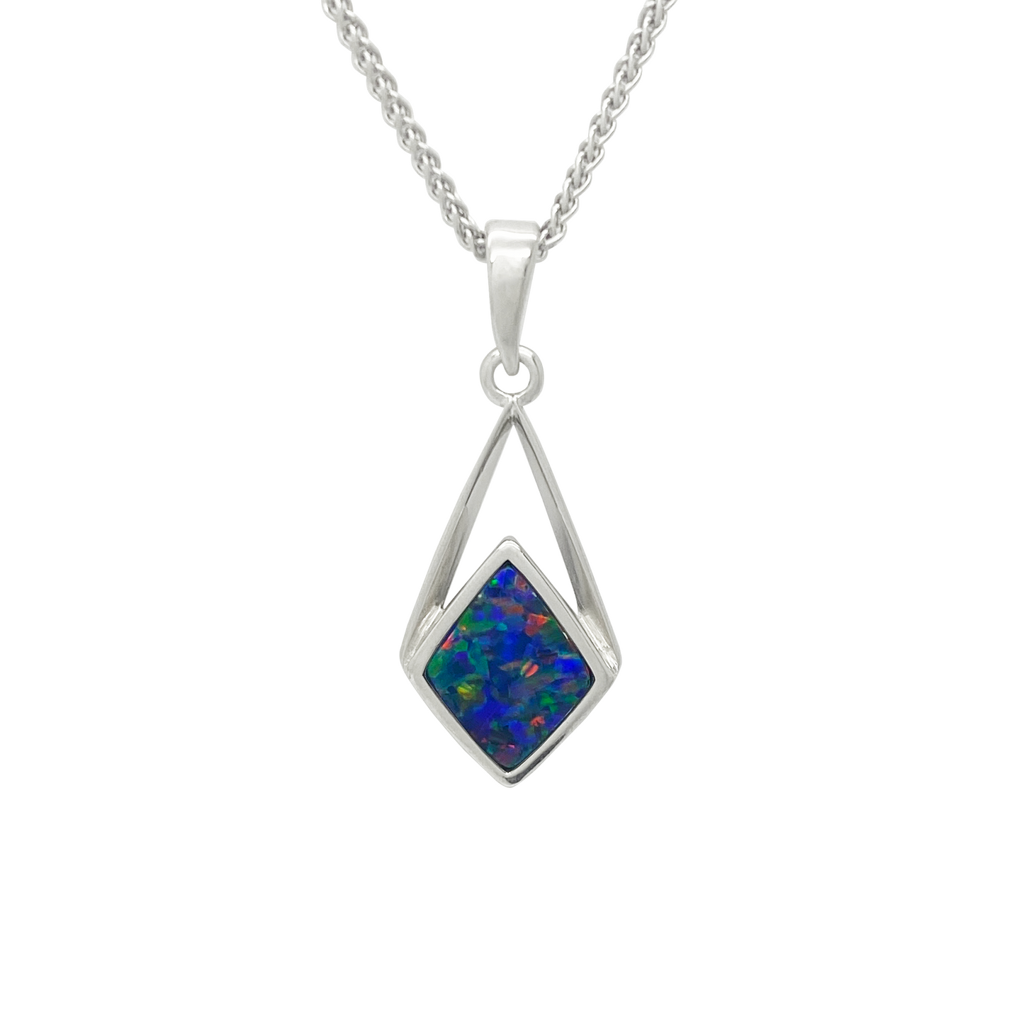 Silver necklace with a diamond-shaped pendant featuring a multicolored stone on a white background