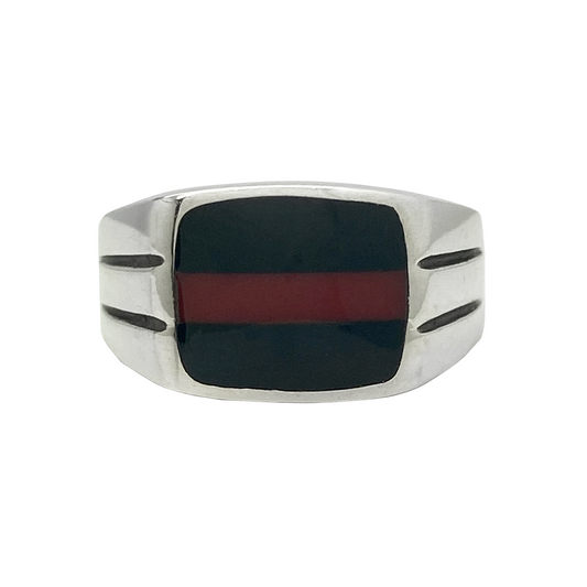 Silver ring with a black and red inlay on a white background