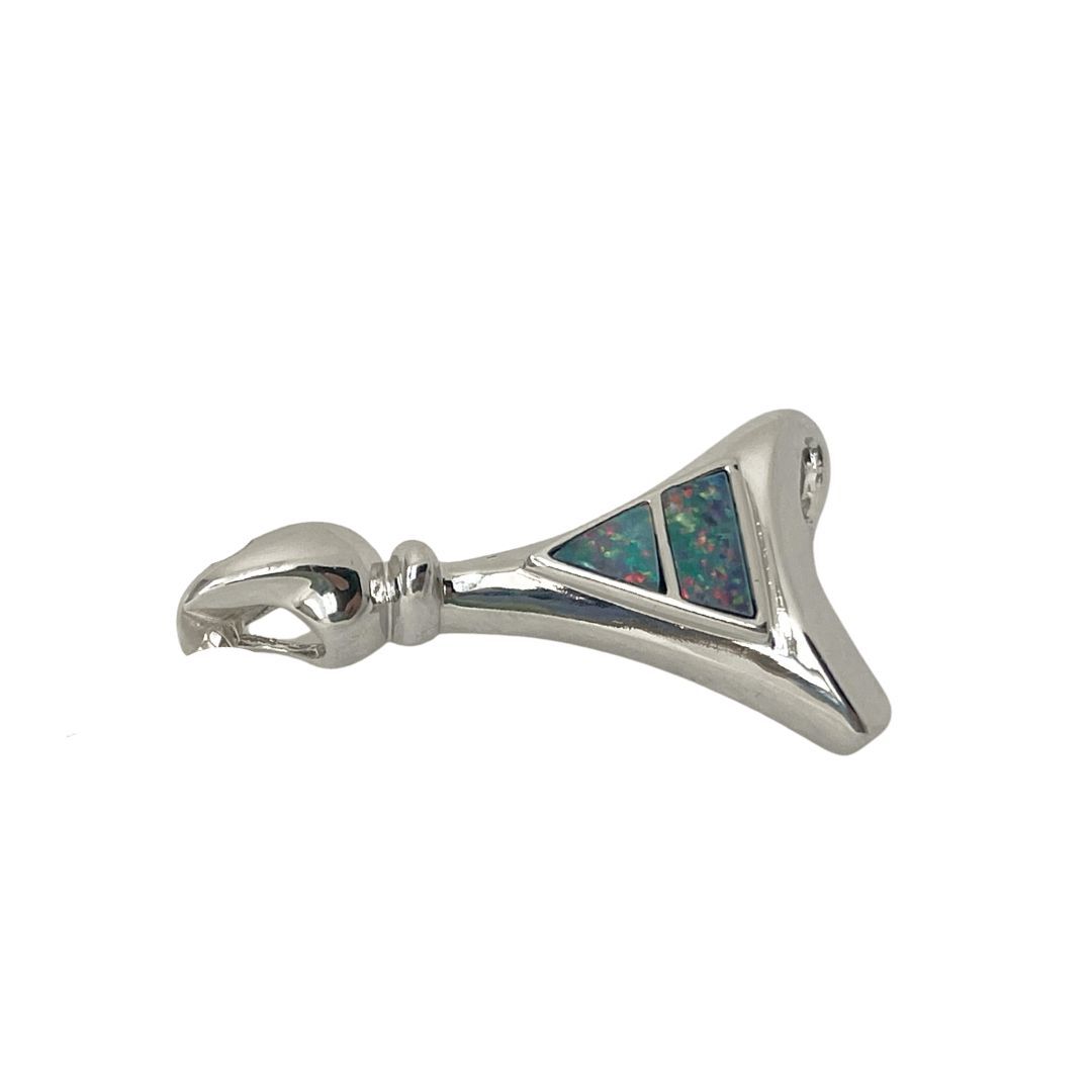 Silver pendant with a triangular design on a white background