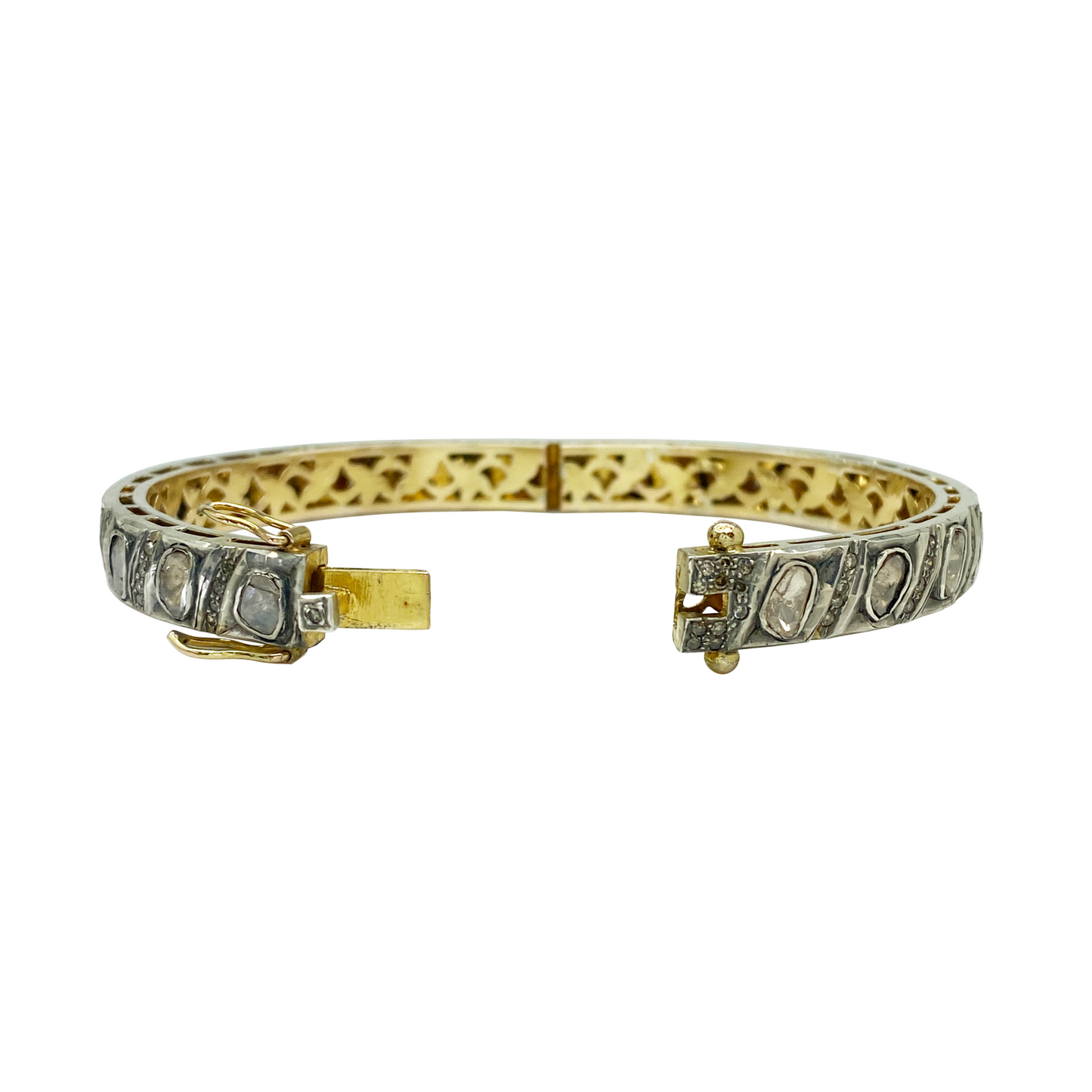 Gold and silver bracelet with diamond accents on a white background