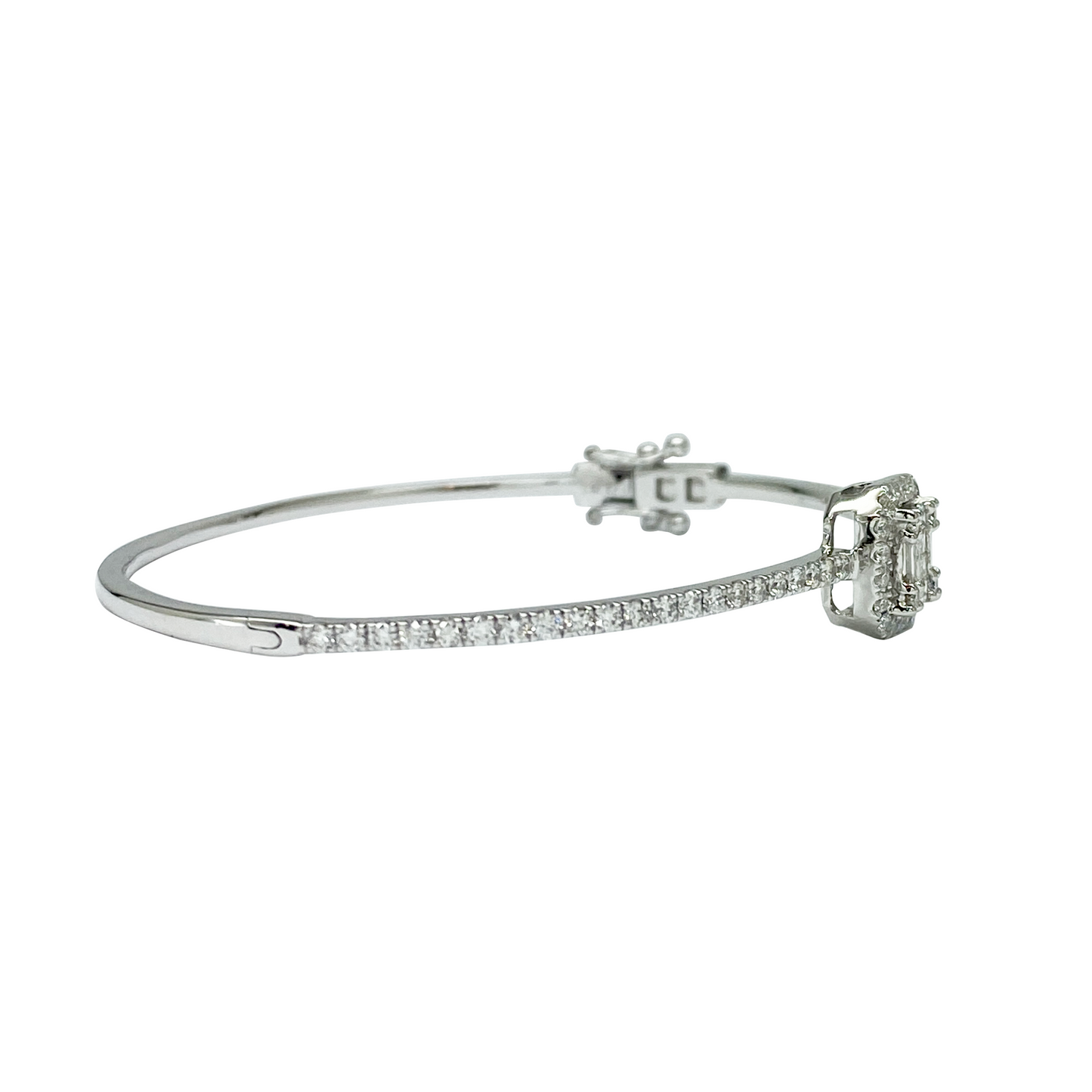 Silver bracelet with small diamonds on a white background