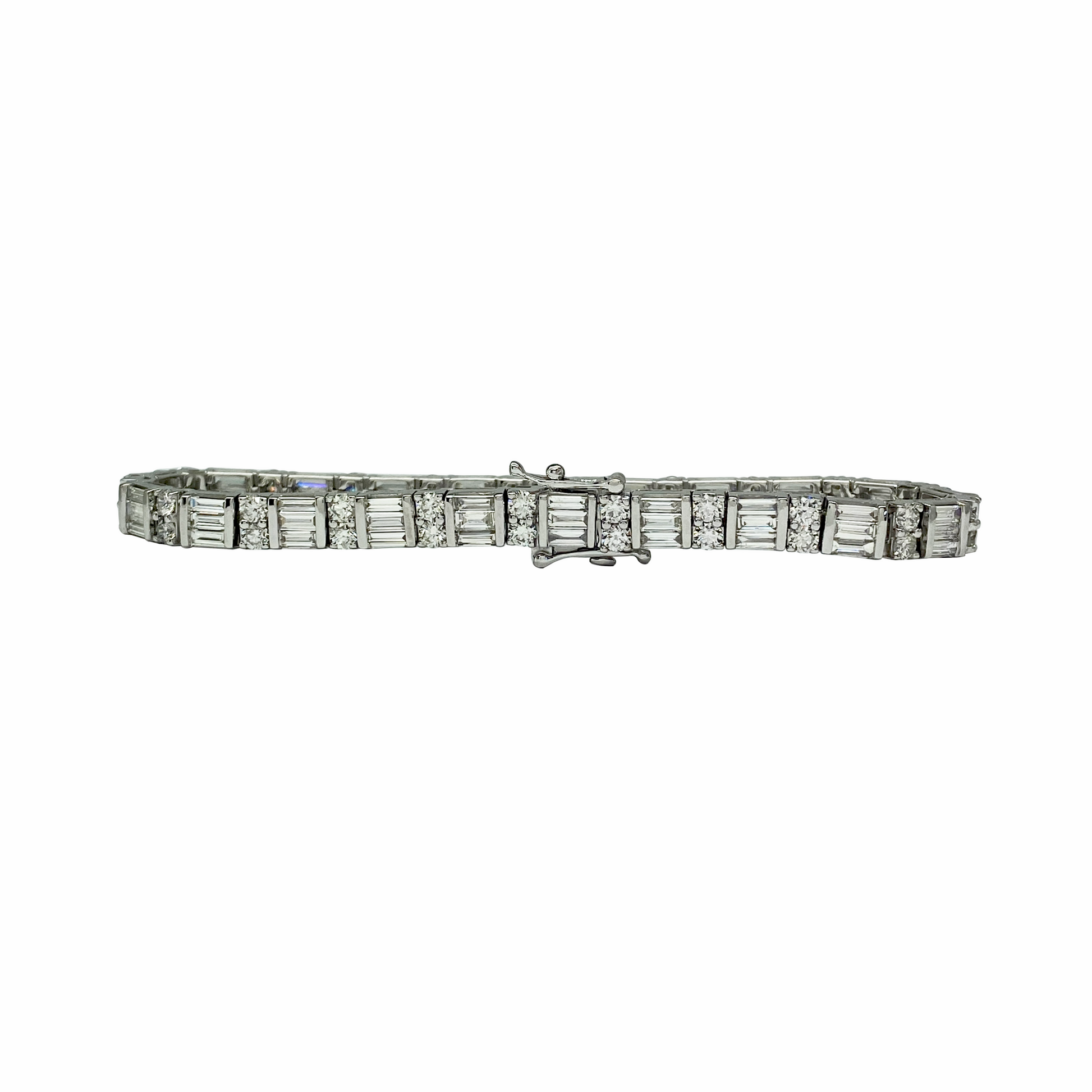 Diamond bracelet with baguette and round cut stones on a white background