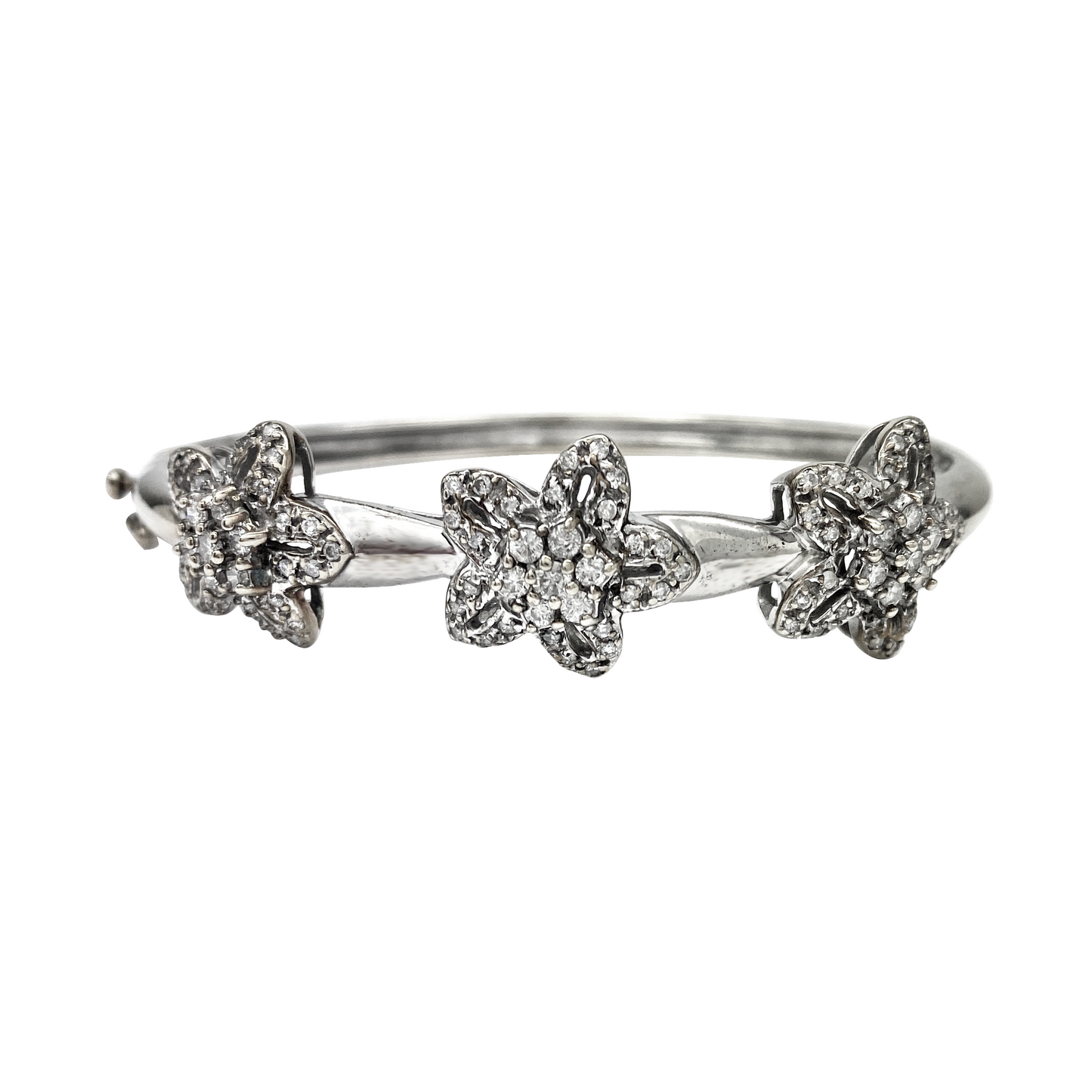 Silver bracelet with flower shaped charms on a white background
