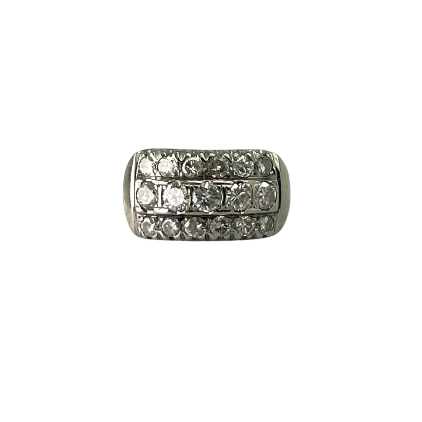 Silver ring with embedded diamonds on a white background