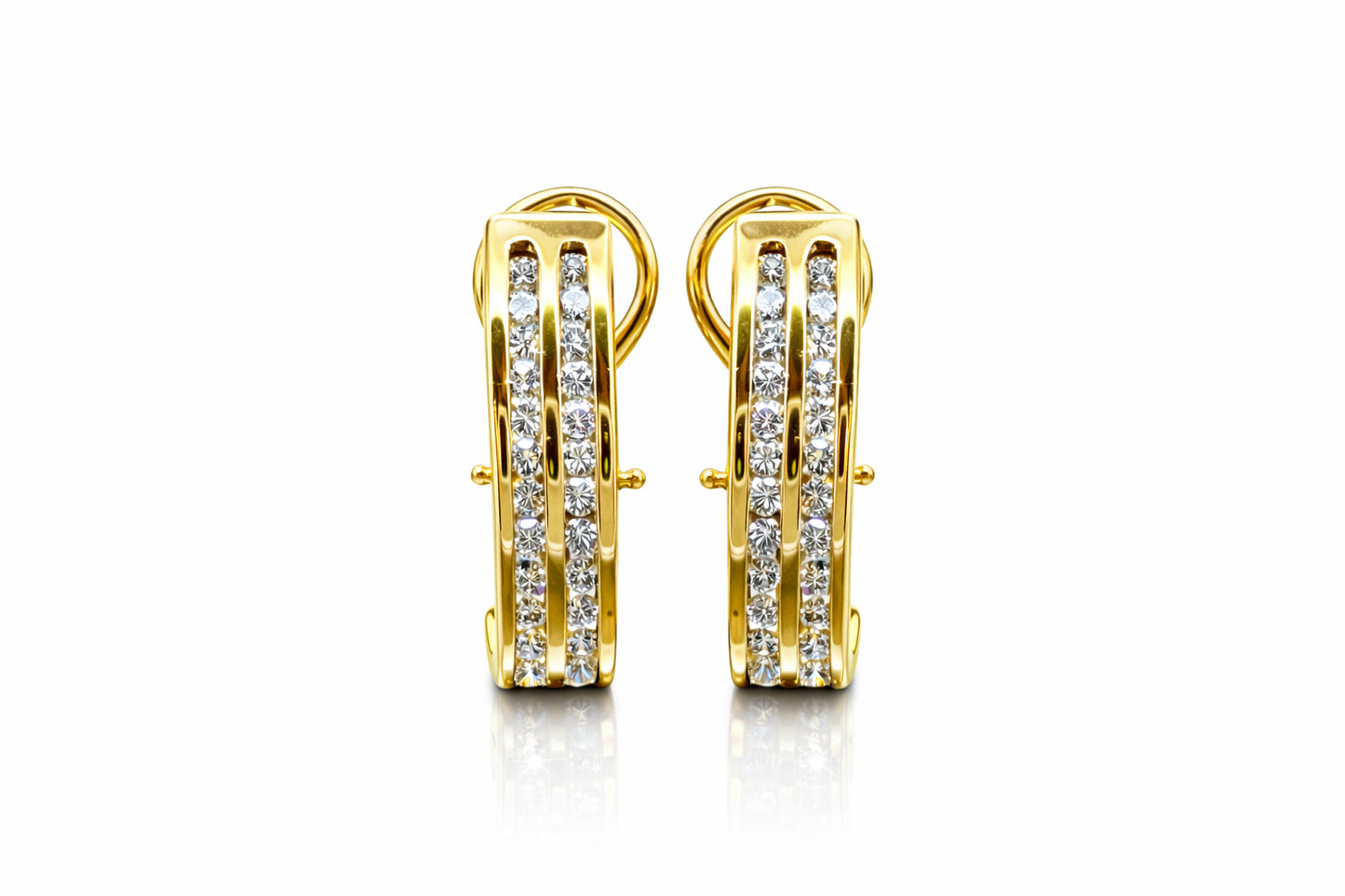 Gold hoop earrings with embedded diamonds on a white background