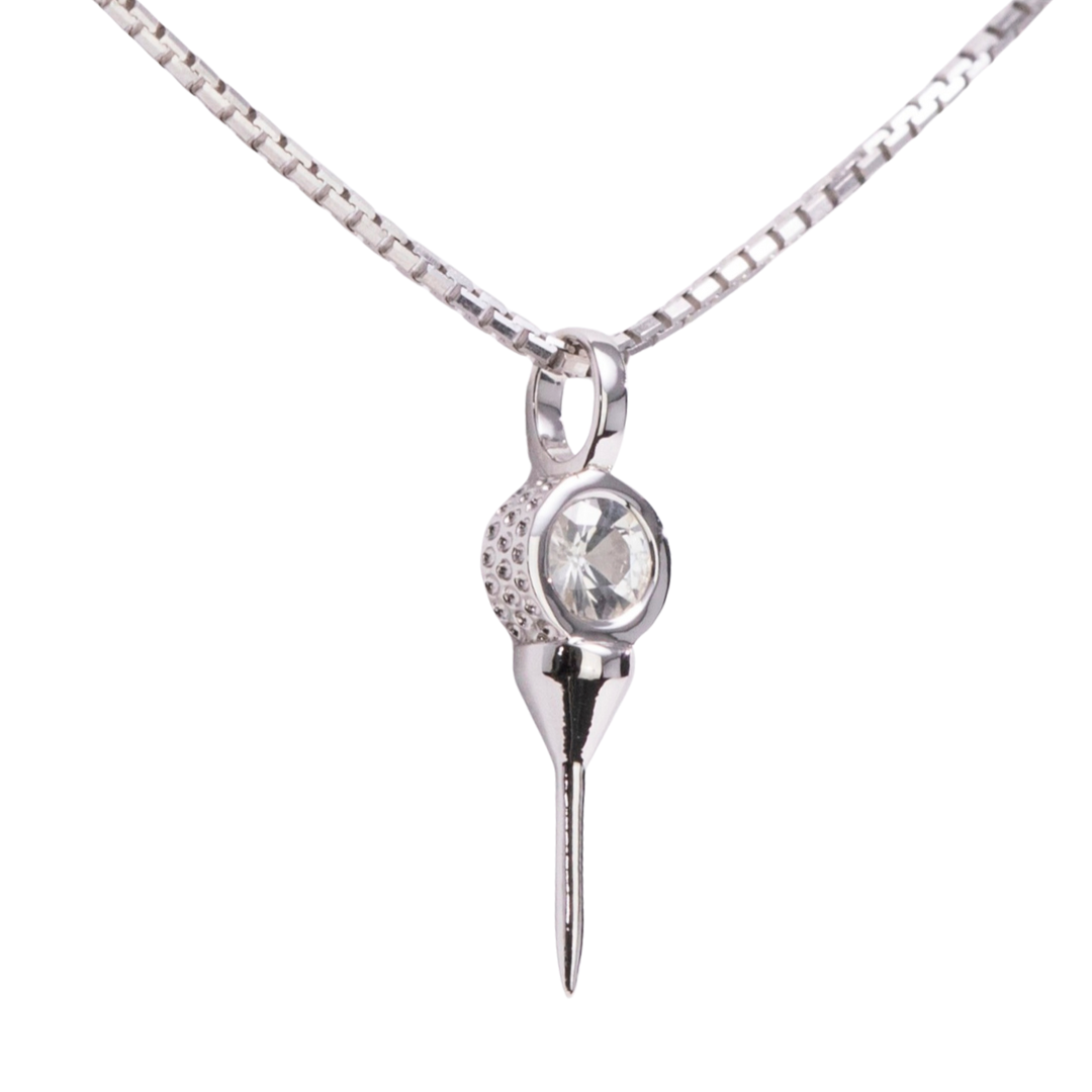 Silver golf pendant with a clear gemstone on a white background
