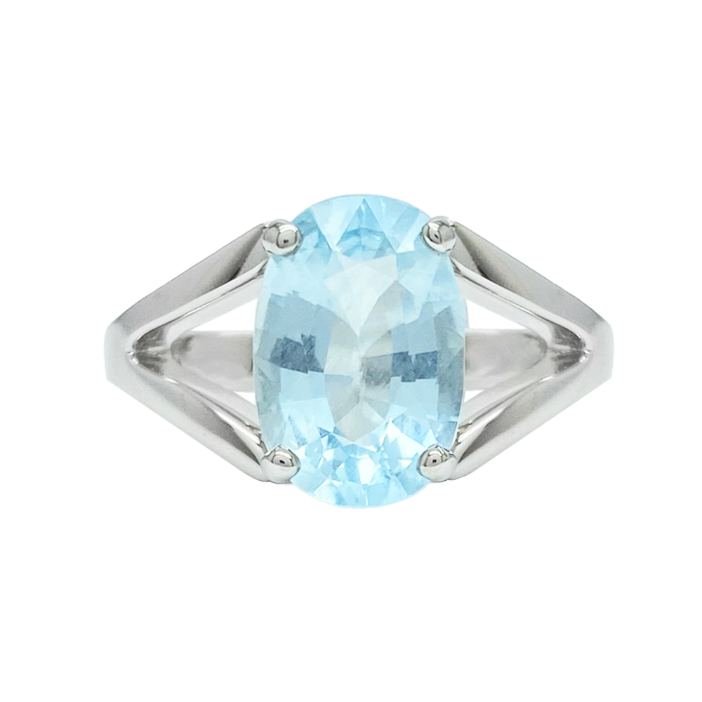 Sterling silver ring with a large oval blue topaz stone.