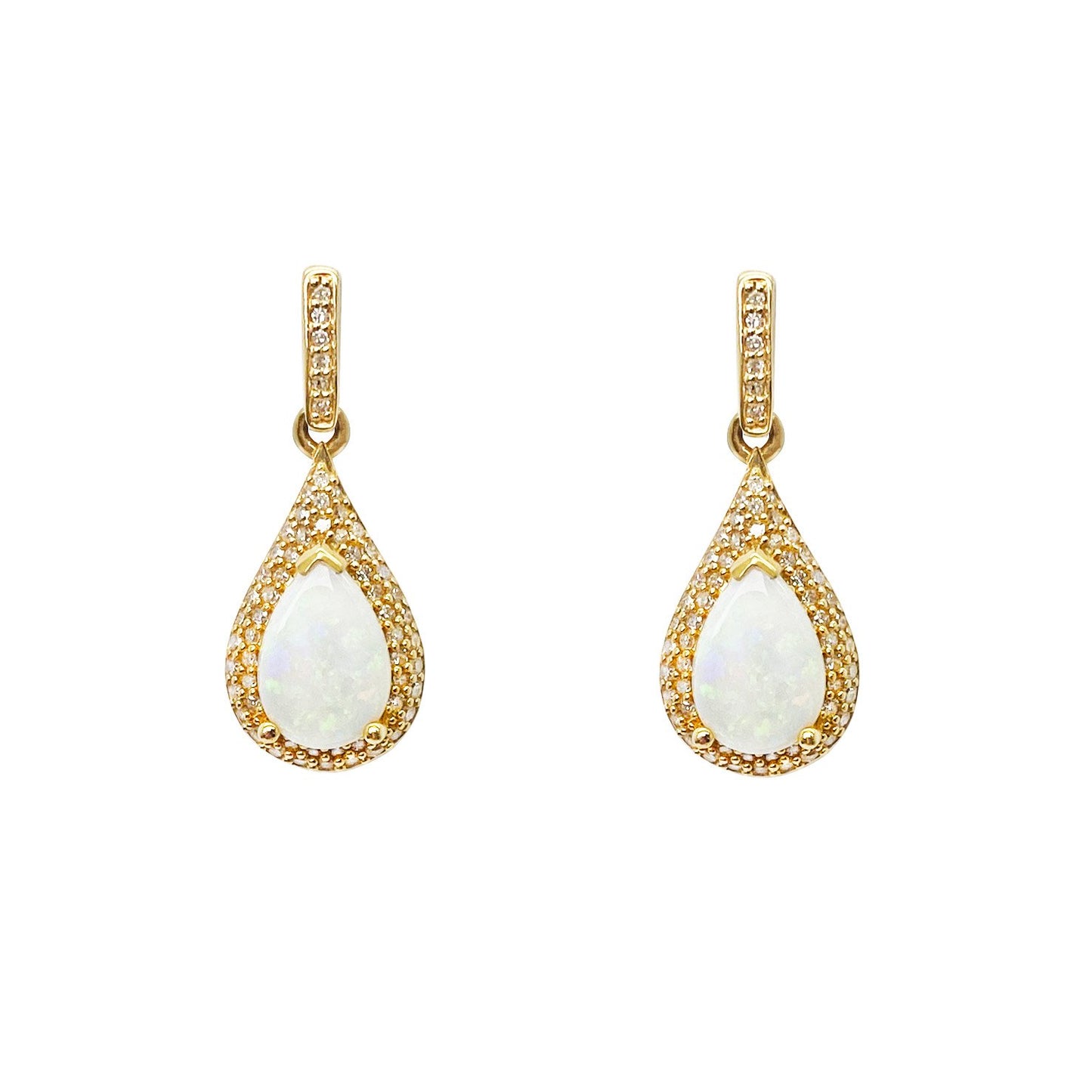 Gold drop earrings with pear-shaped opals surrounded by diamonds. The background is white.
