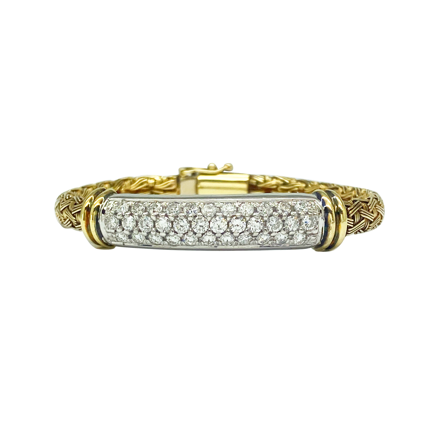 Gold and diamond bracelet with woven design.