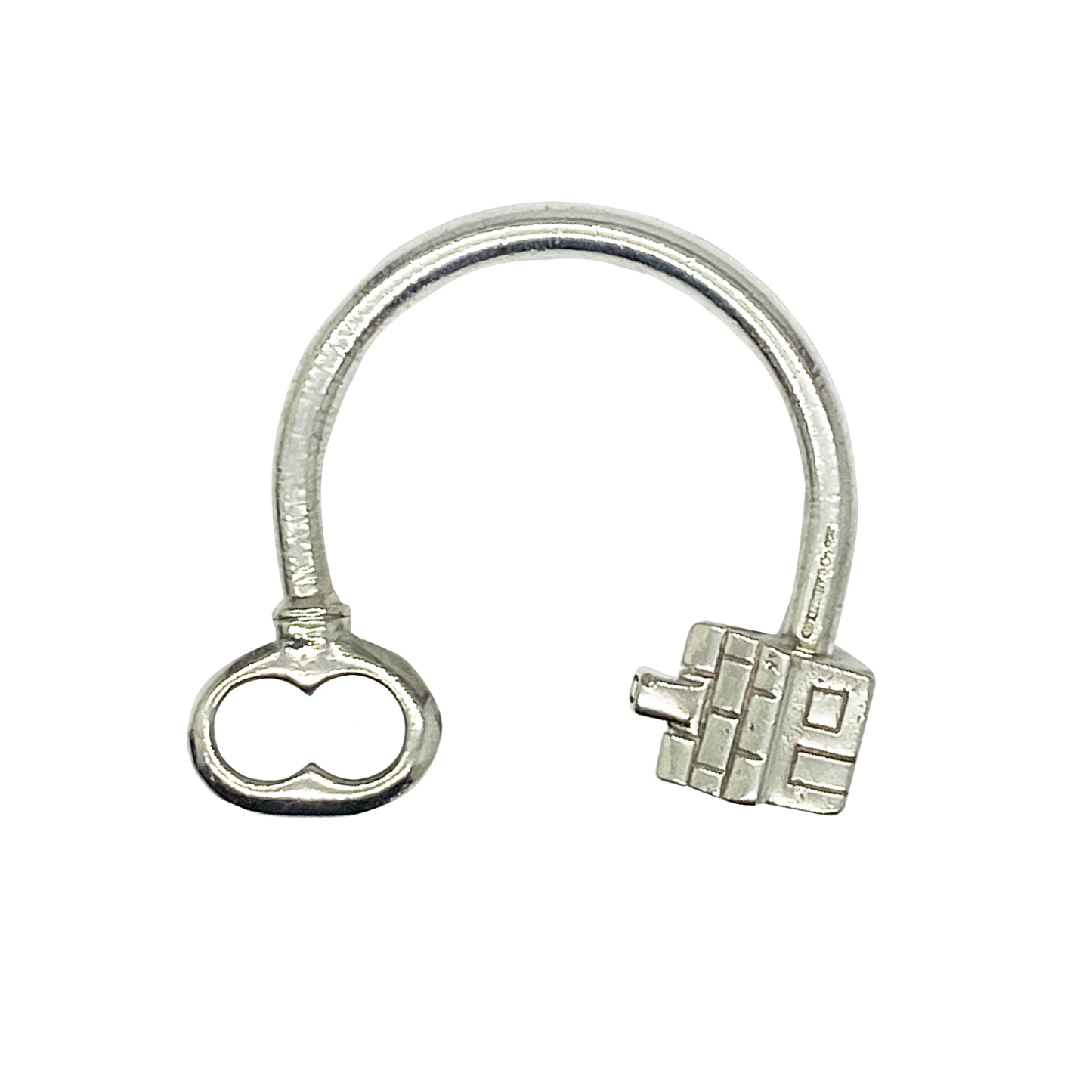 Silver keychain with house and key charms.