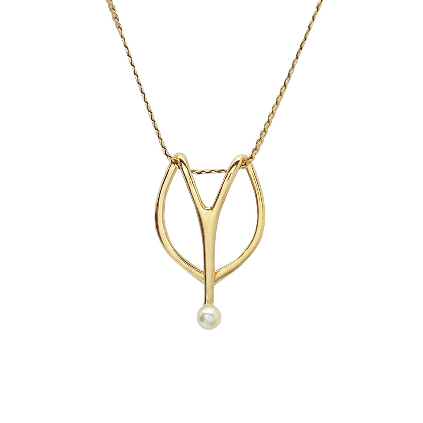 Gold pendant necklace with pearl on a white background