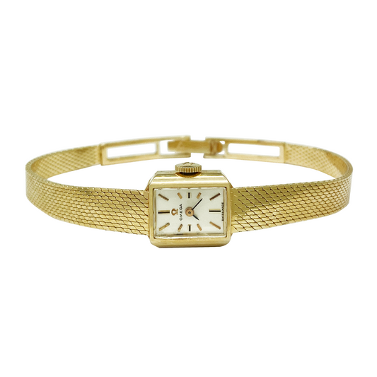 Gold wristwatch with a square face on a white background