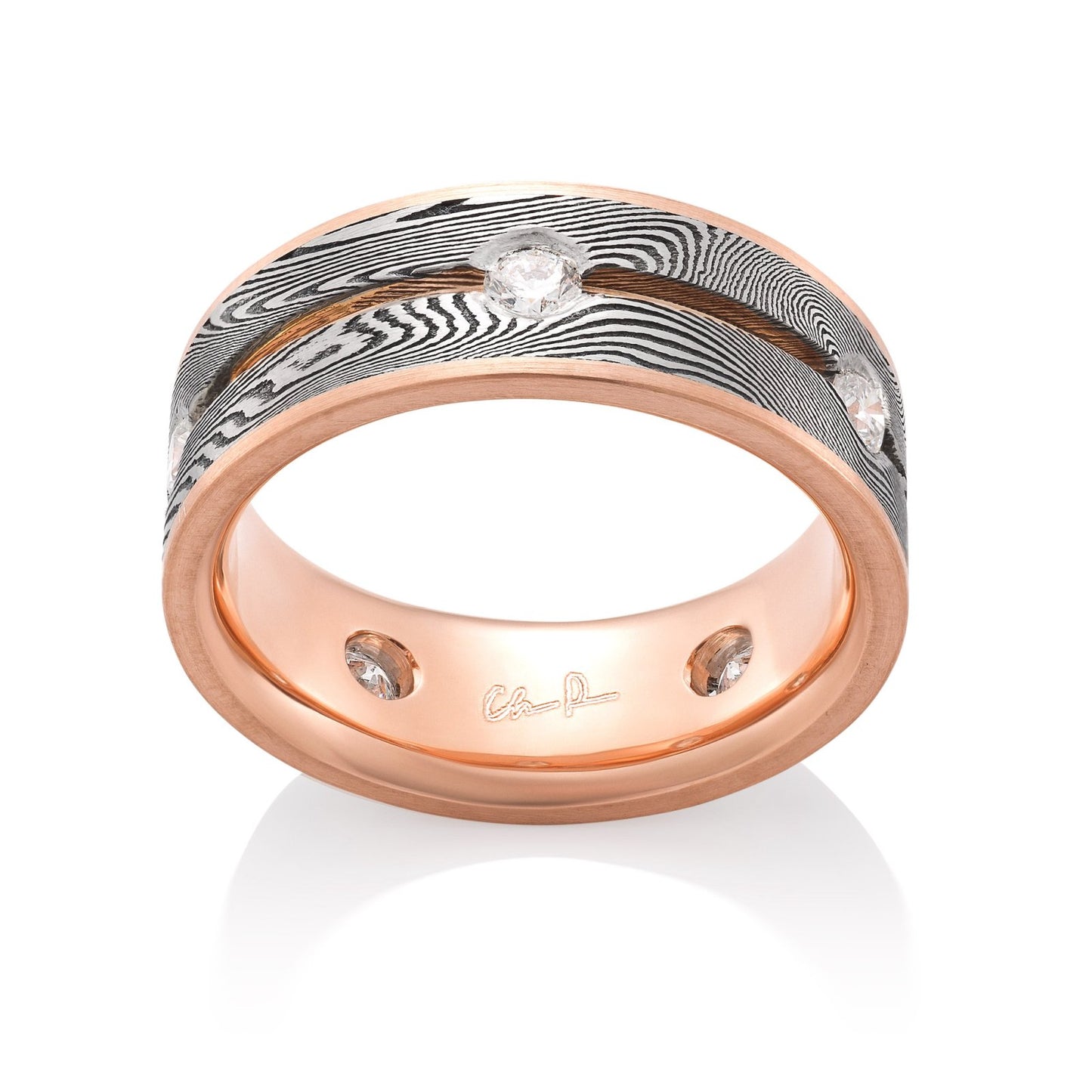 Rose gold ring with a Damascus steel pattern and diamond accents on a white background