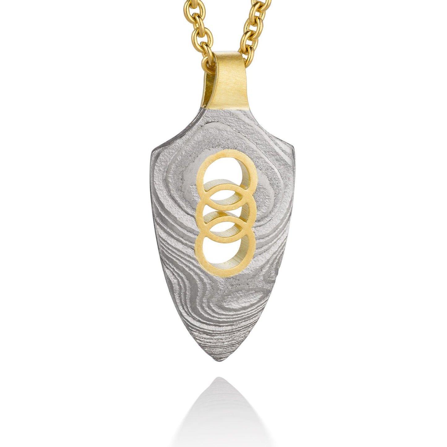 Gold shield-shaped Damascus necklace on a white background.