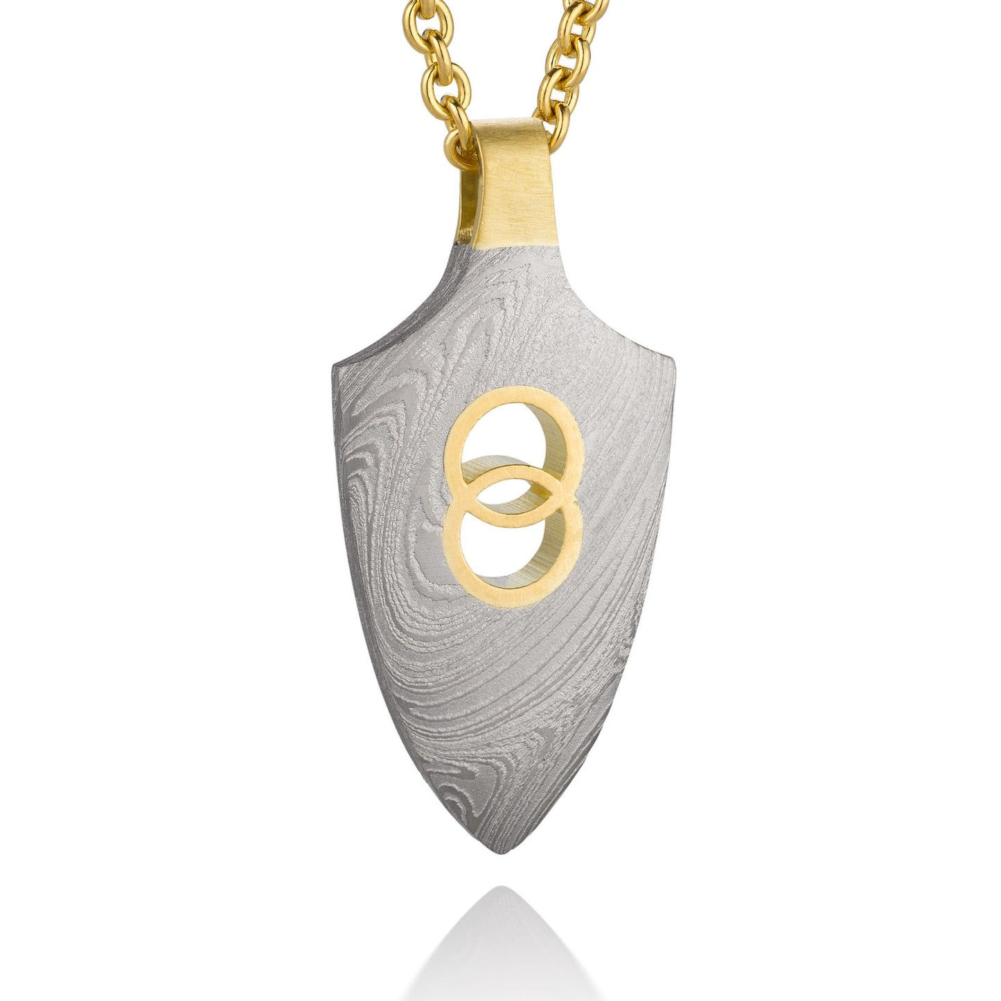 Gold shield-shaped Damascus necklace on a white background.