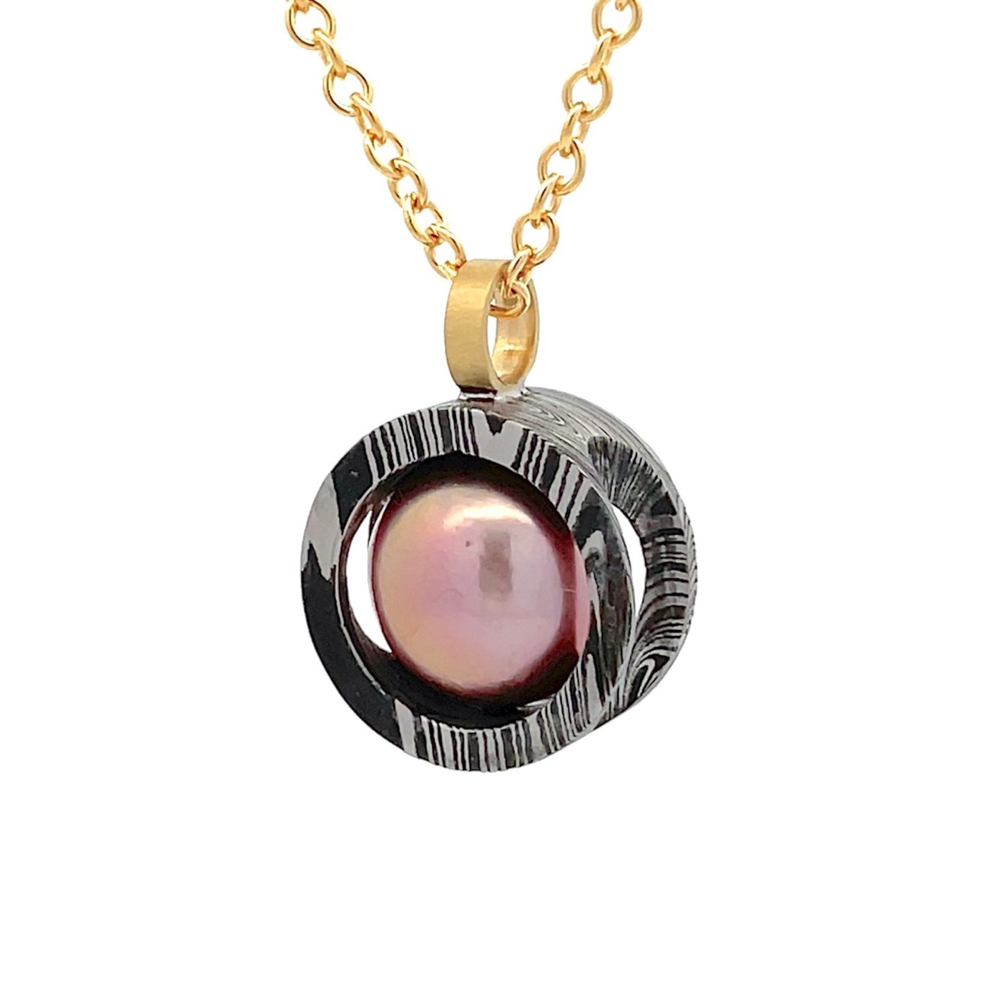 Gold chain necklace with a pink pearl pendant on a white background.