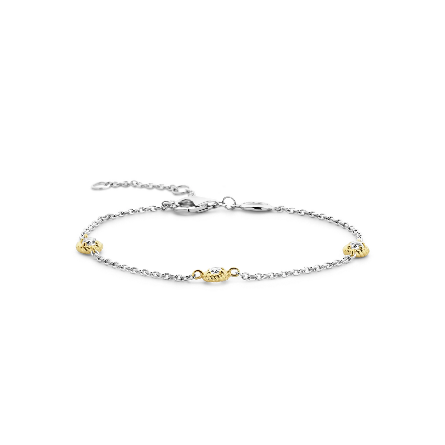 Bracelet with gold and silver charms on a white background