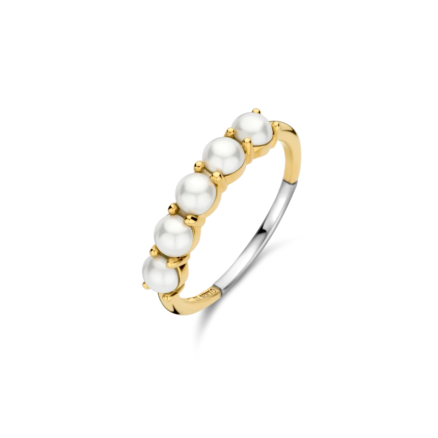 Gold and silver ring with pearls on a white background