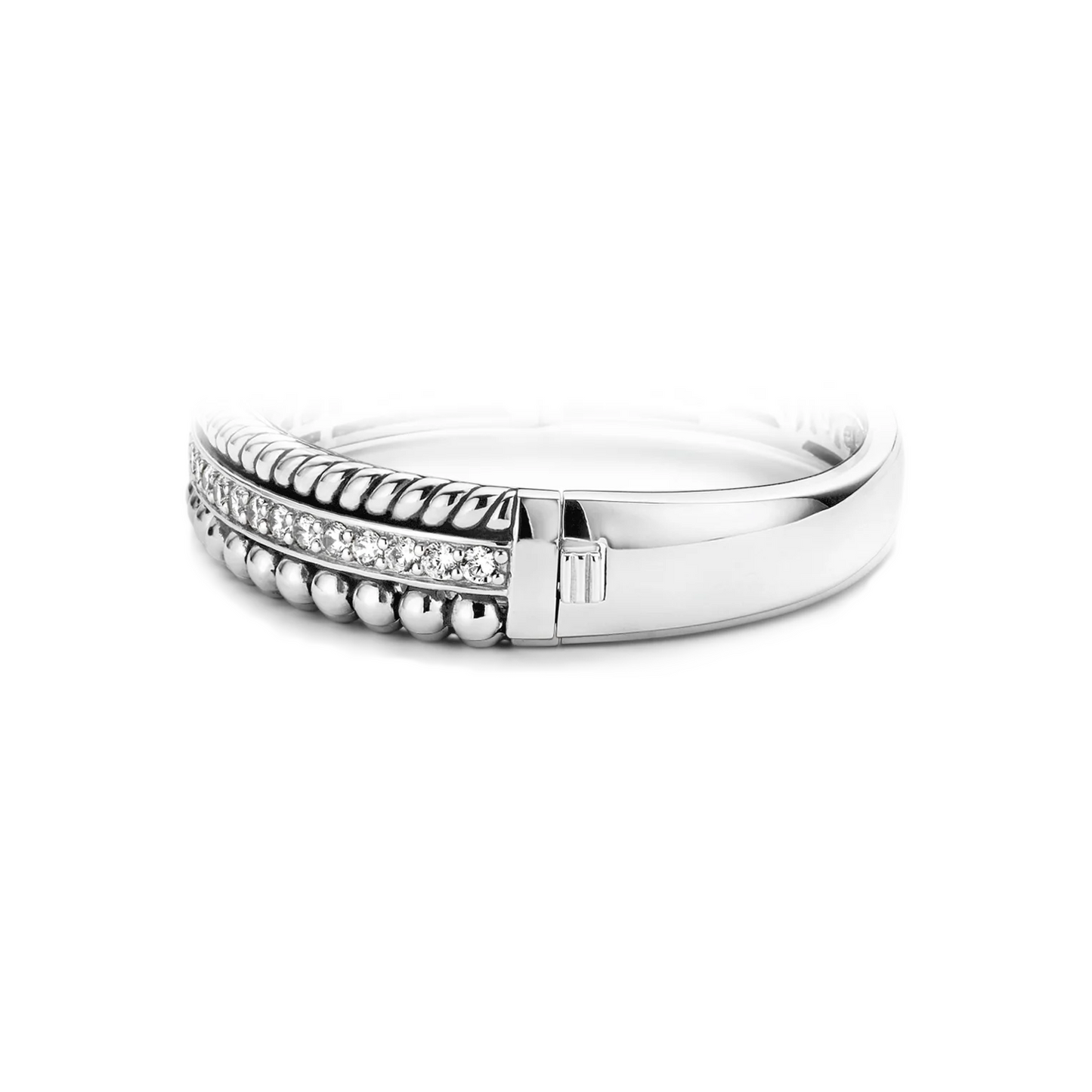 Silver ring with intricate design on a white background