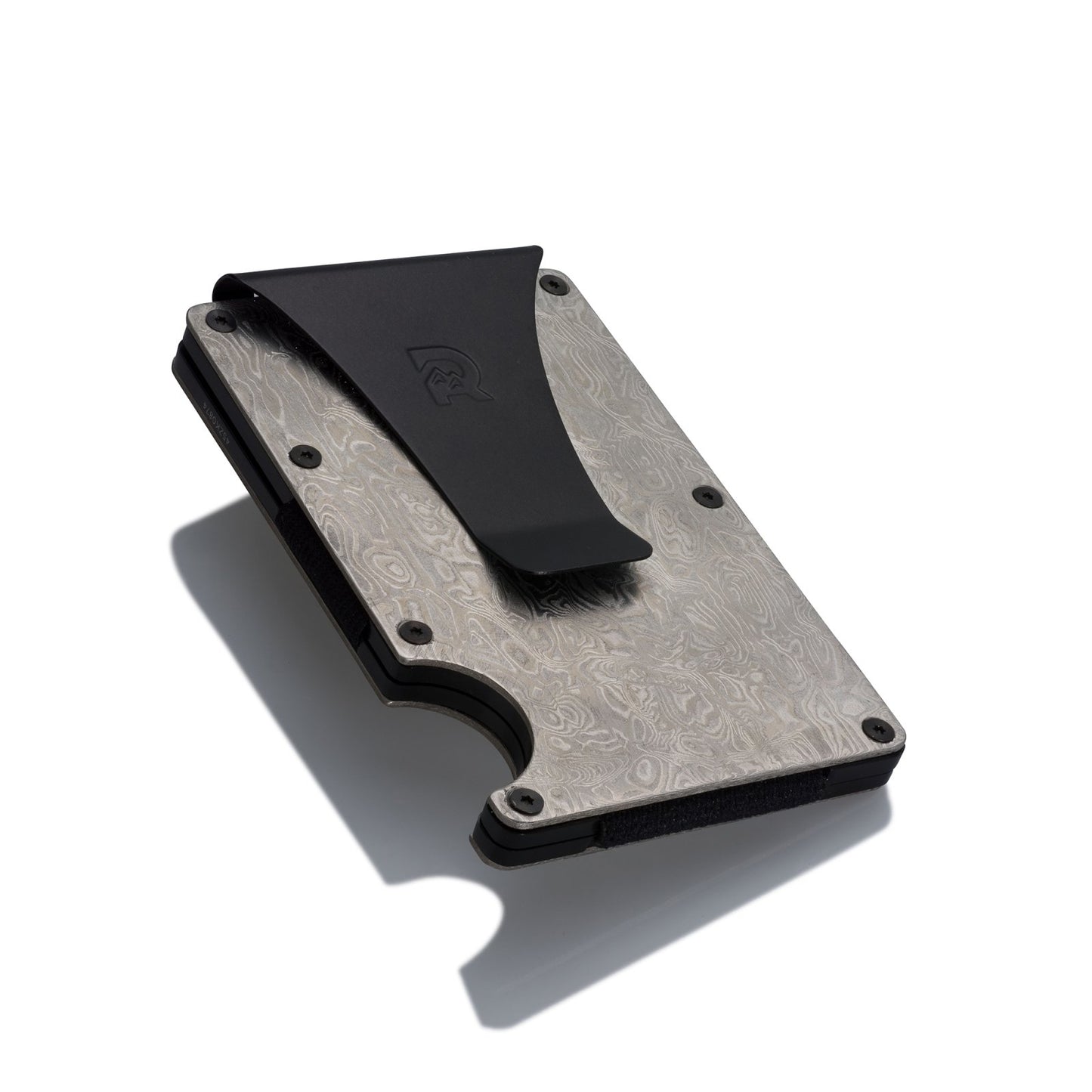 Silver-colored wallet with a textured, Damascus steel pattern in the center, on a white background