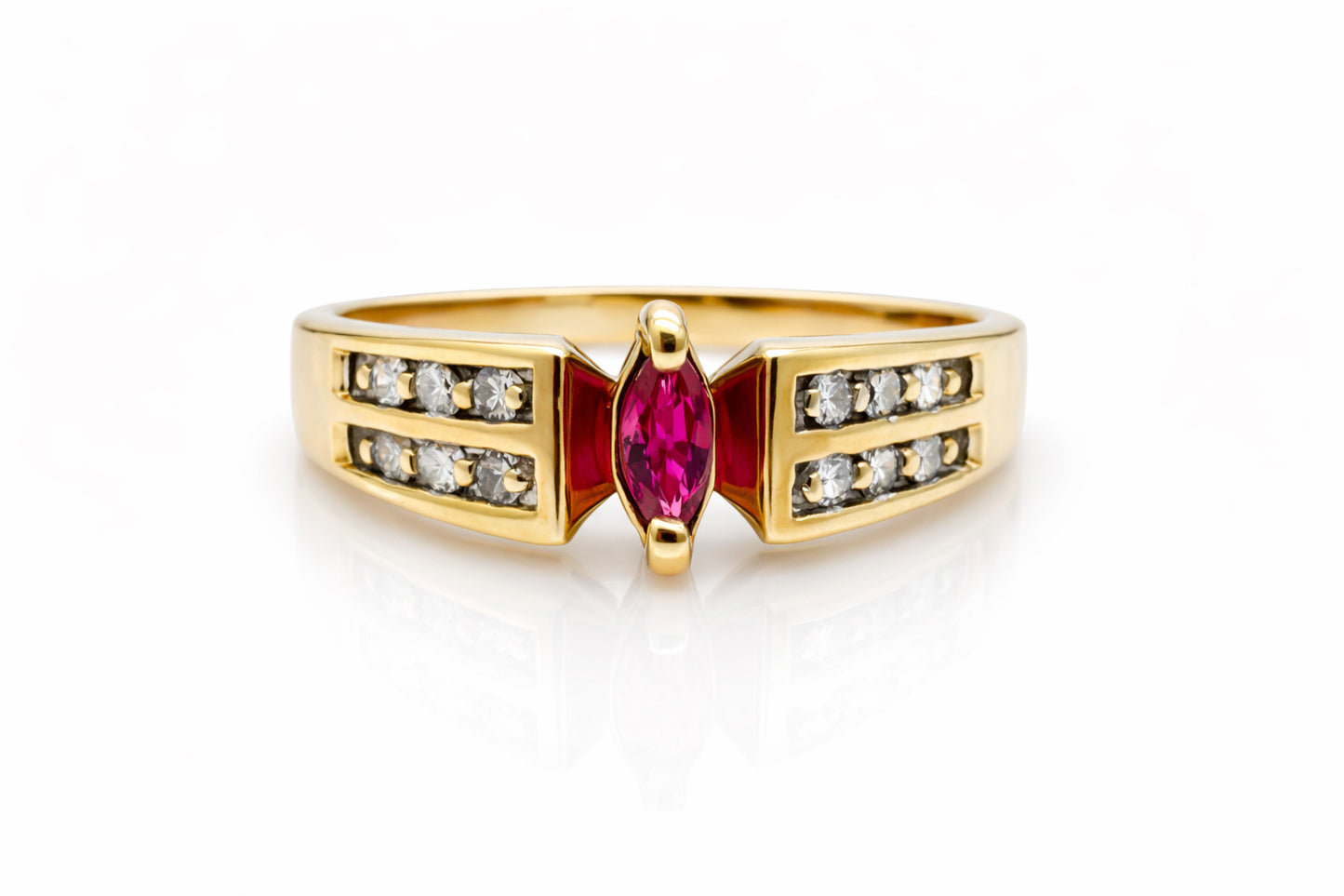 Gold ring with a red gemstone and diamonds on a white background