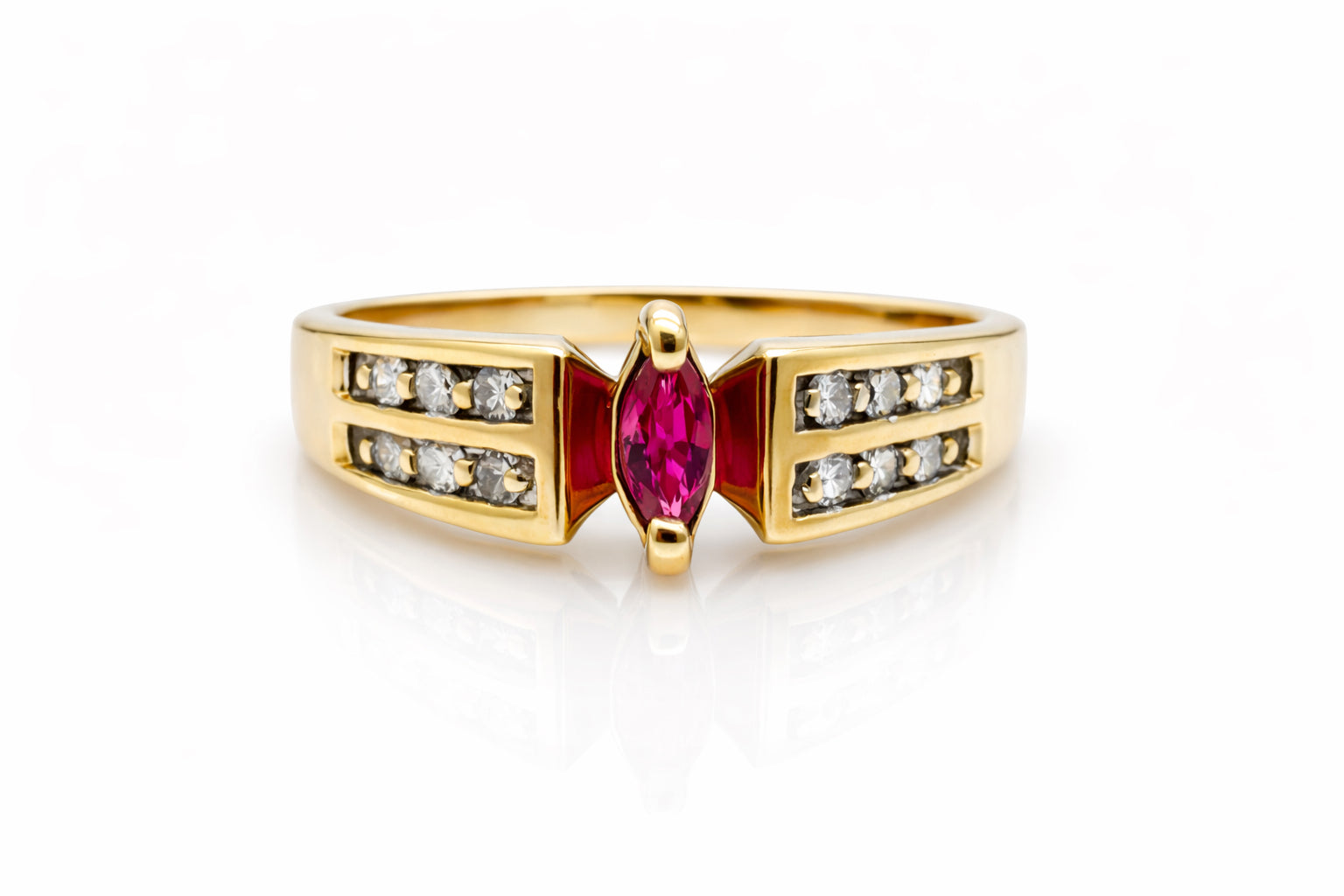 Gold ring with a red gemstone and diamonds on a white background