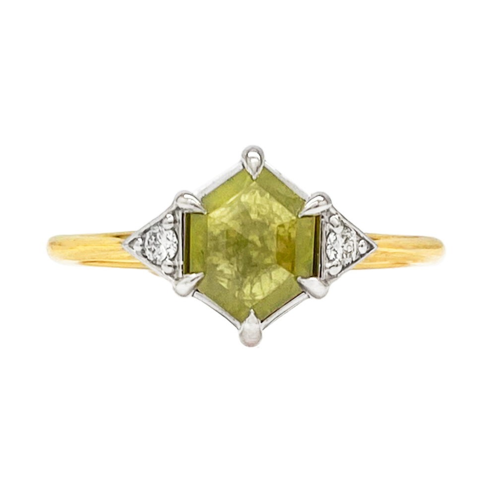 Gold hexagonal yellow diamond ring with diamond accents.