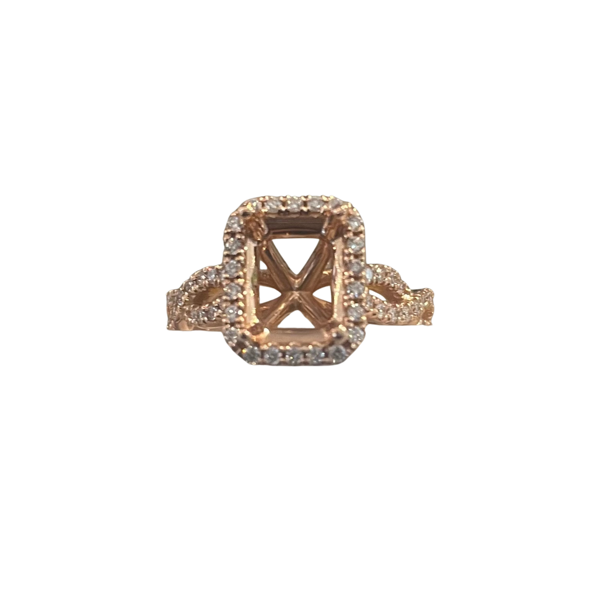 Rose gold ring with diamond accents on a white background