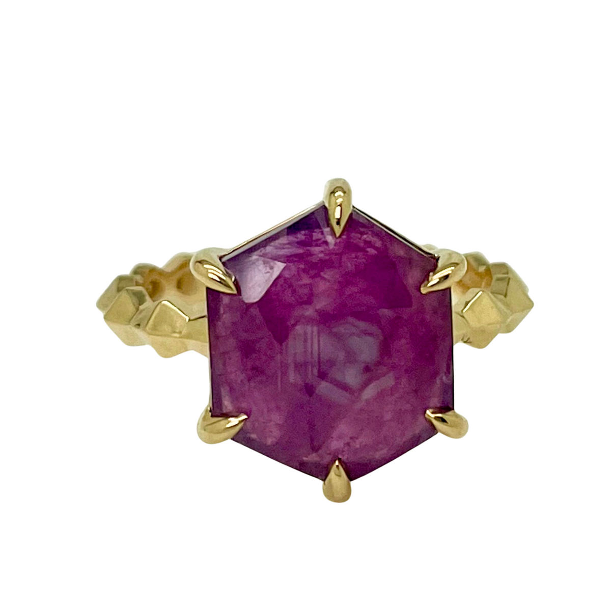 14K Yellow Gold ring with a ruby gemstone on a white background