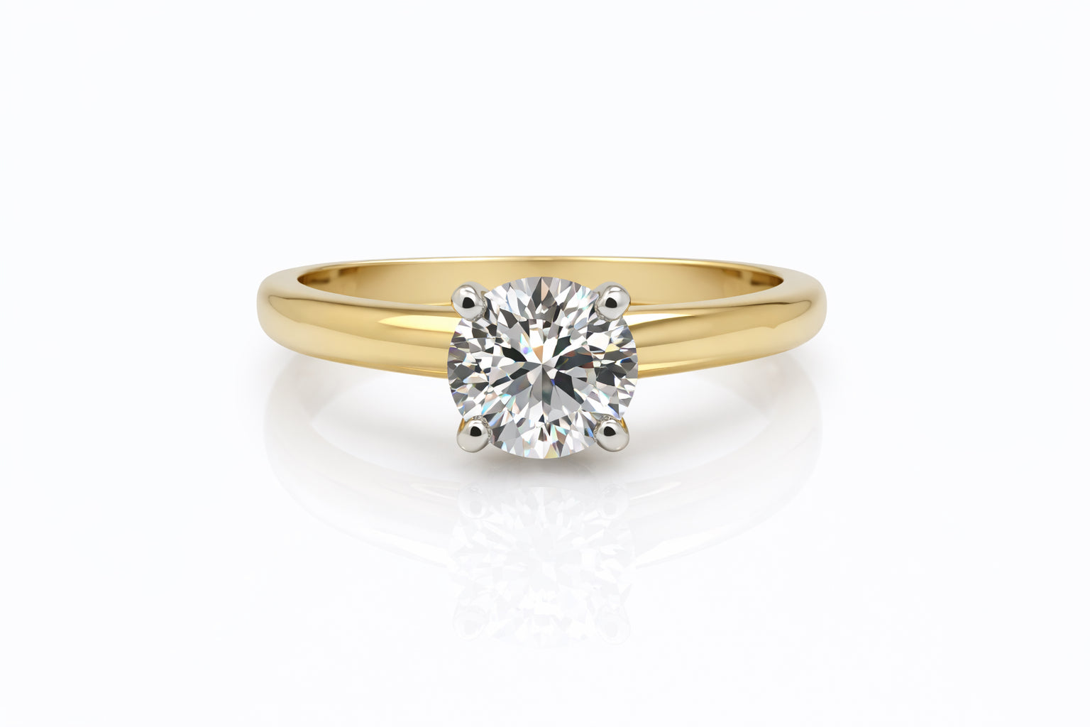 Gold ring with a diamond on a white background