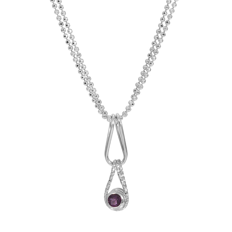Silver necklace with a teardrop-shaped pendant featuring a purple gemstone on a white background.