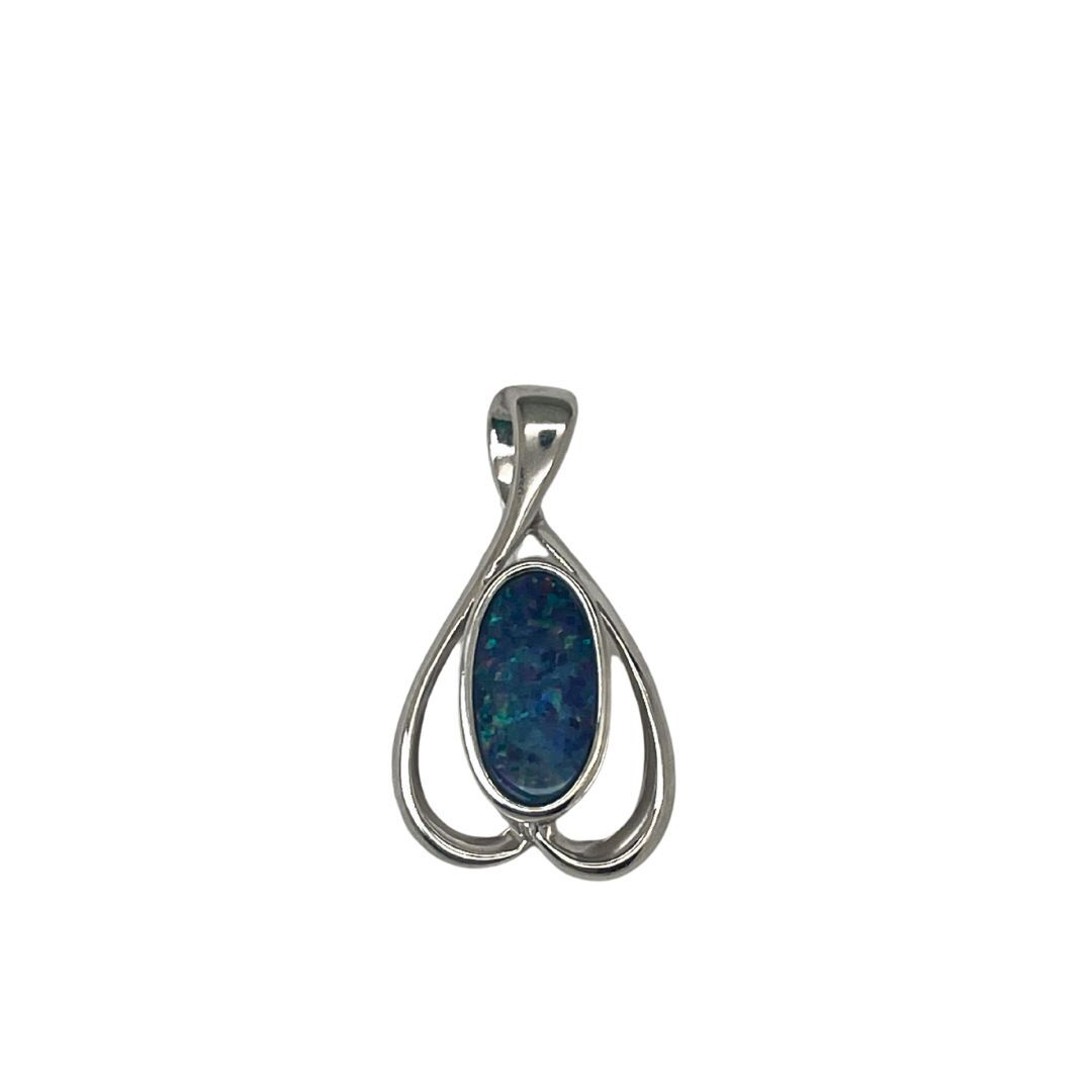 Silver pendant with a blue stone on a white background