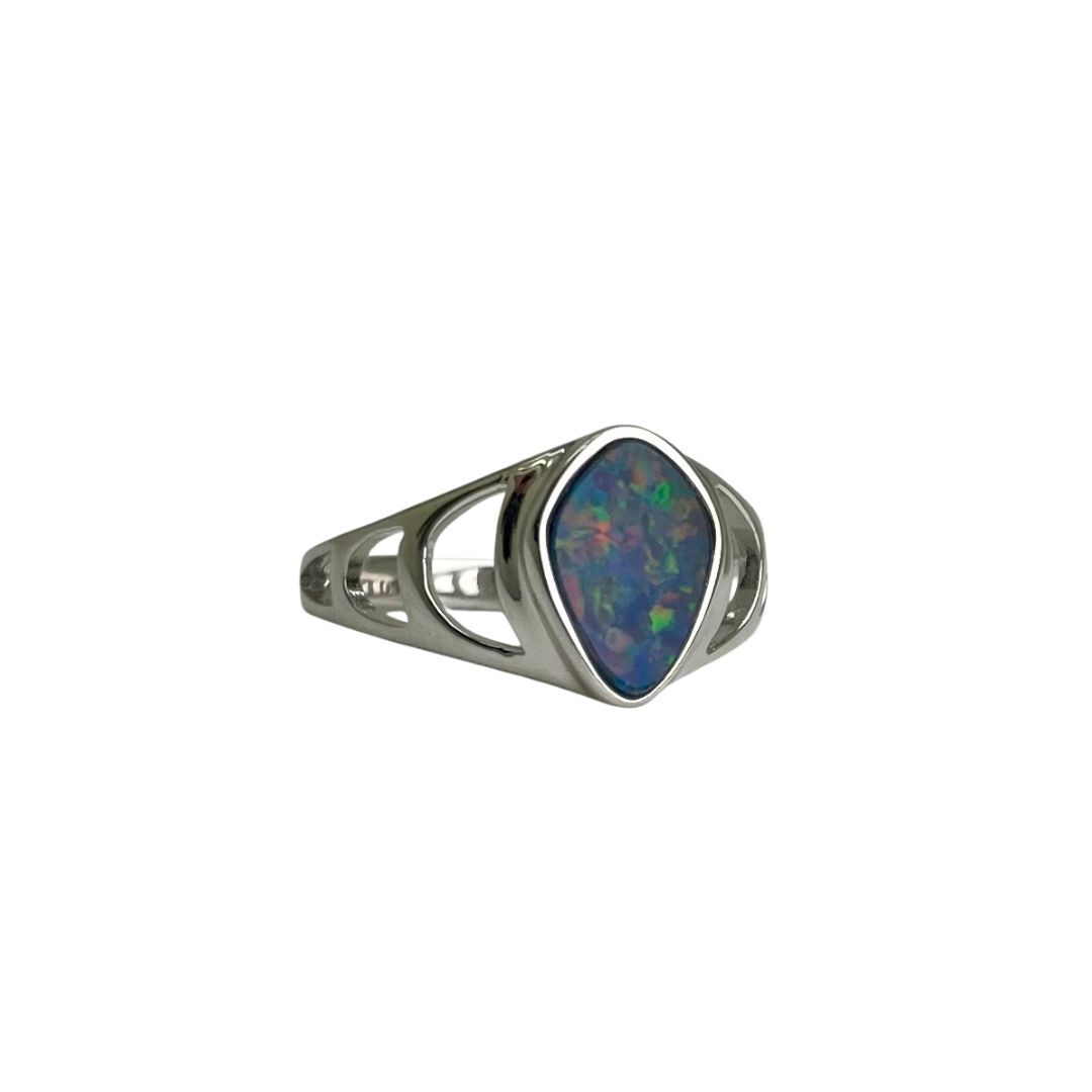 Silver ring with a teardrop-shaped opal stone on a white background