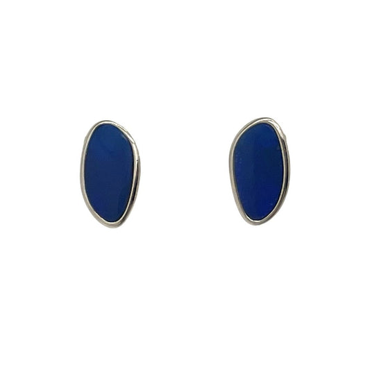 Pair of blue oval earrings with silver rims on a white background
