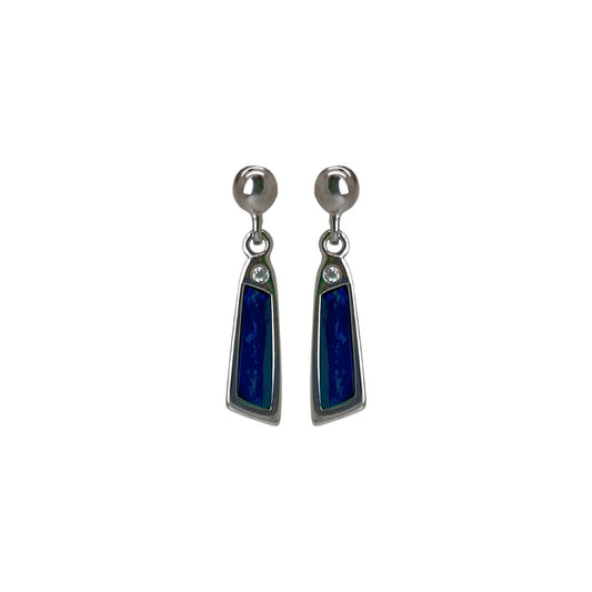 Pair of silver earrings with blue stones on a white background