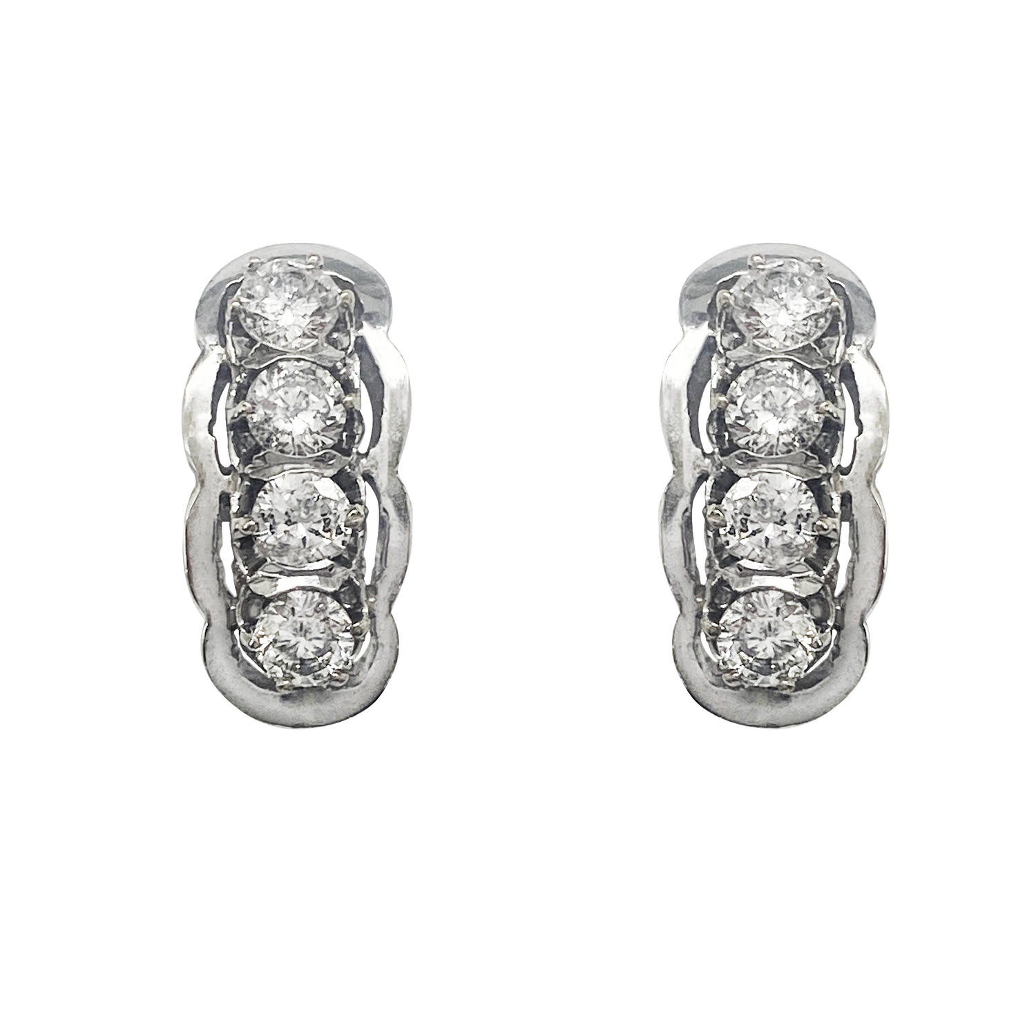 Four-stone vertical diamond stud earrings.