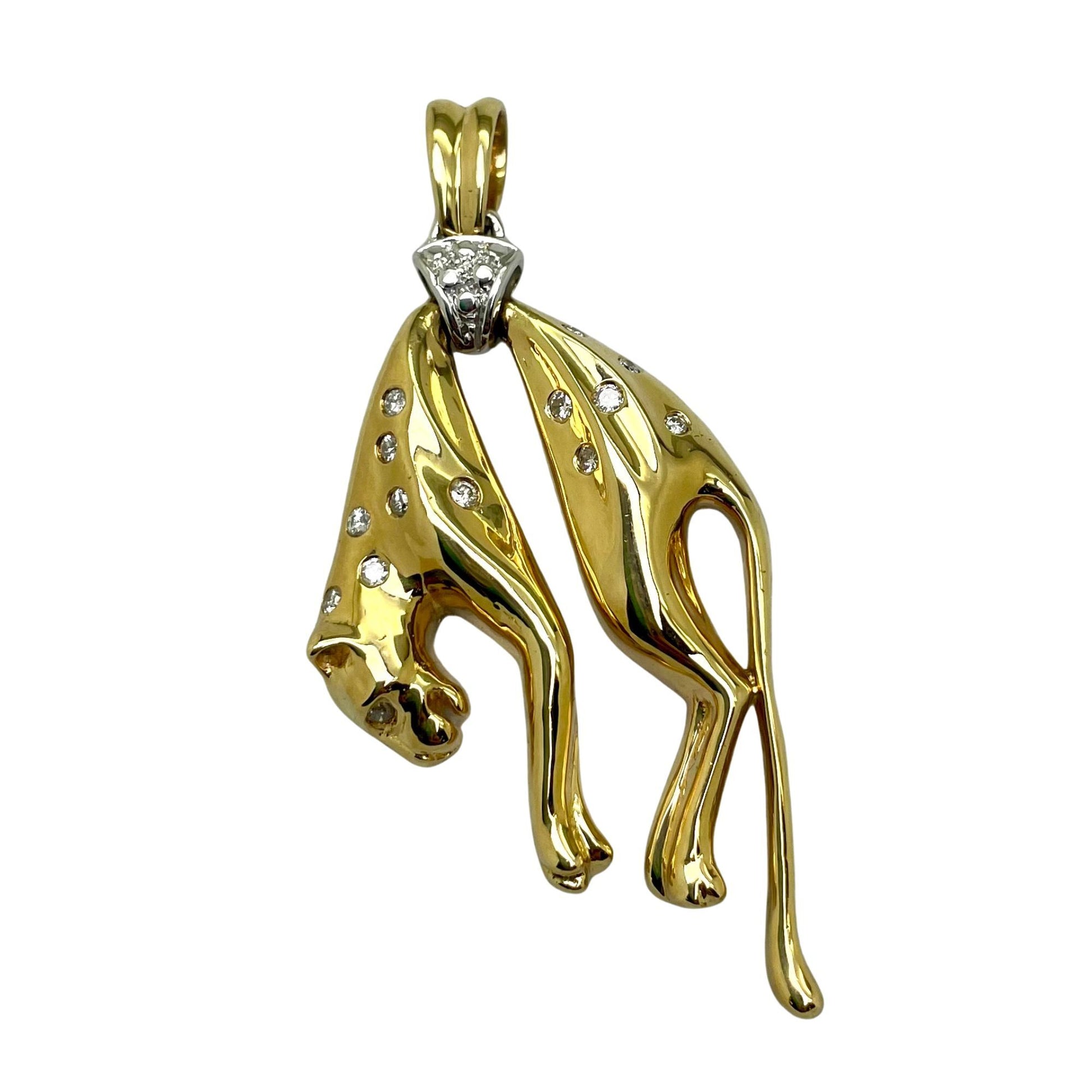 Gold dog-shaped pendant with embedded diamonds on a white background