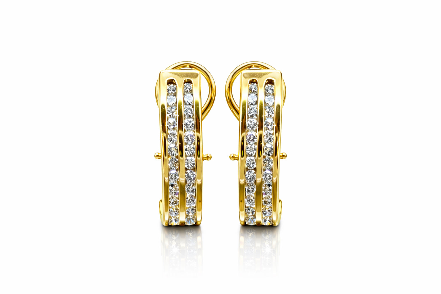 Gold hoop earrings with embedded diamonds on a white background