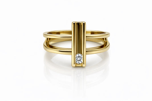 Gold ring with a diamond on a white background