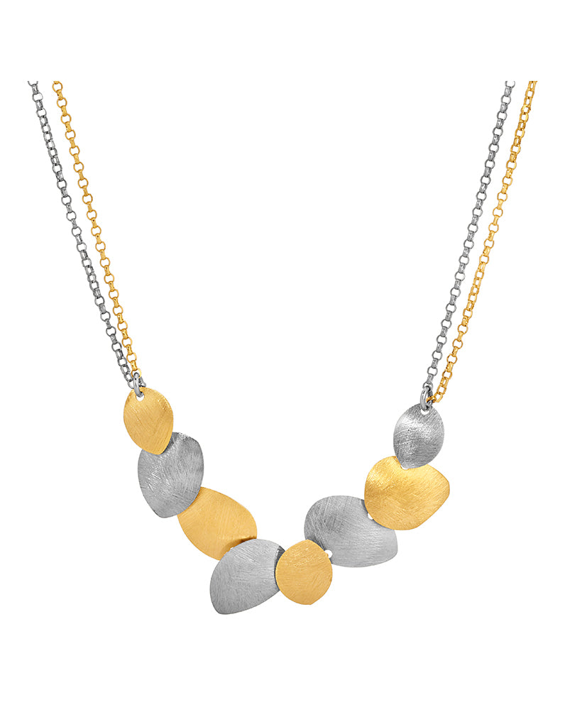 Necklace with gold and silver beads on a white background